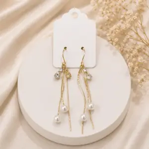 Ohrringe „Golden Pearl Cascade“